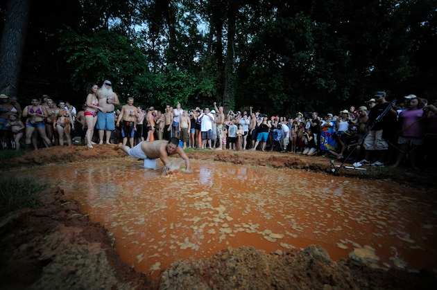 Party-goers seek respite from the heat in LOL's new swimming pool.